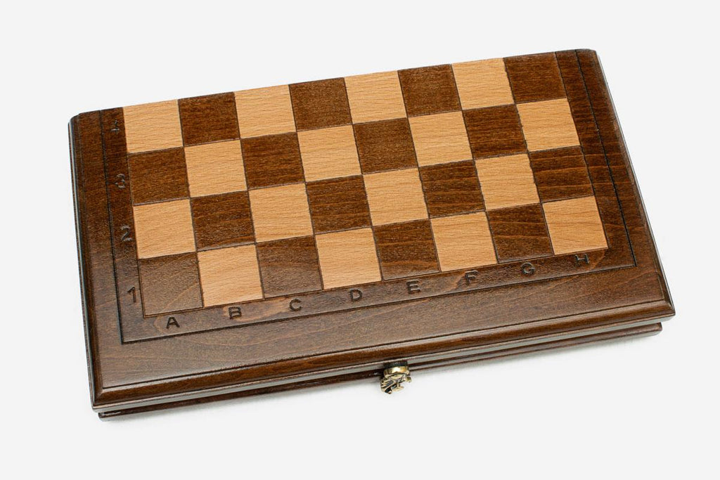 Classic chess set shown folded with carry handle