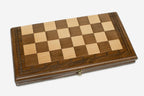 Classic chess and backgammon set shown folded with carry handle