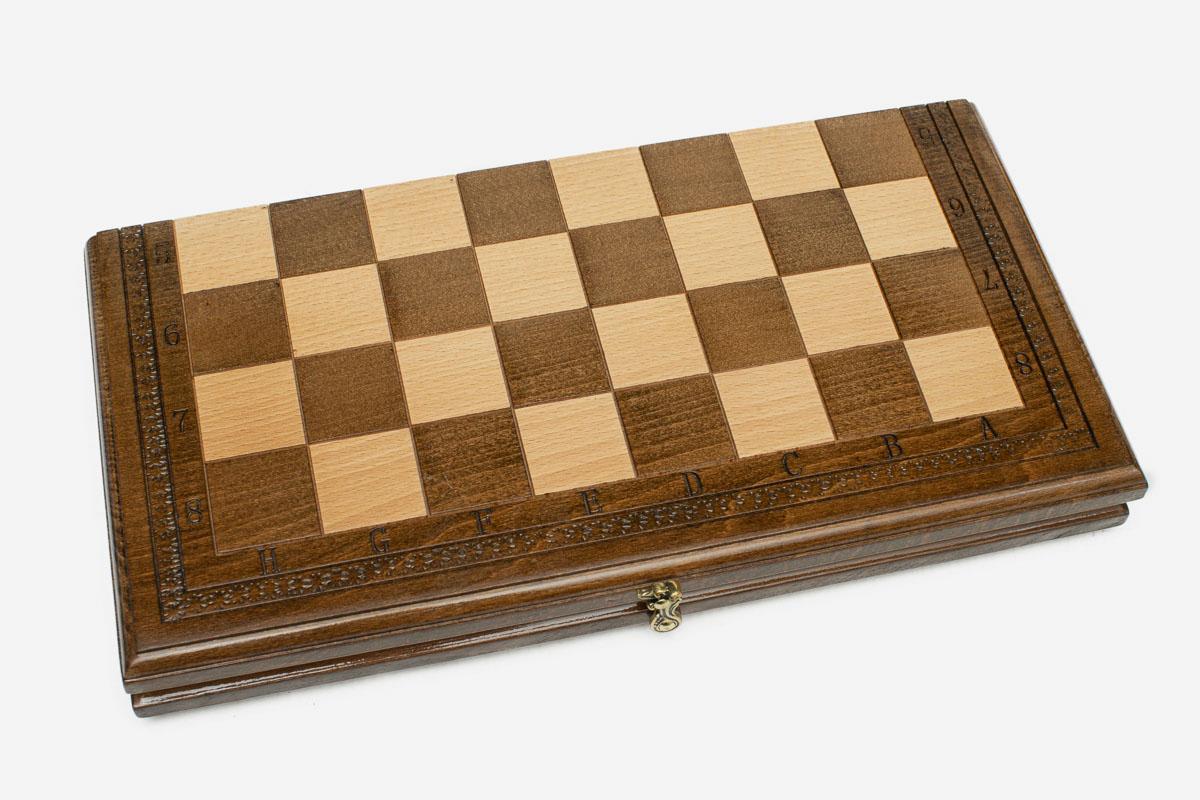 Classic chess and backgammon set shown folded with carry handle