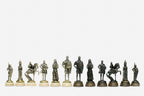 The carved Russian coat-of-arms chess board shown with both bronze armies