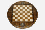 Overhead view of the lattice-carved board and full set of wooden pieces