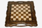 Close-up of a baklava-lattice design carving on the beech board
