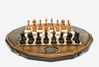 Twelve-sided carved chess board with inlaid coat-of-arms medallions and turned wooden pieces set up for play