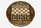 Detail of the inlaid metal coat-of-arms medallion in the lattice-carved border