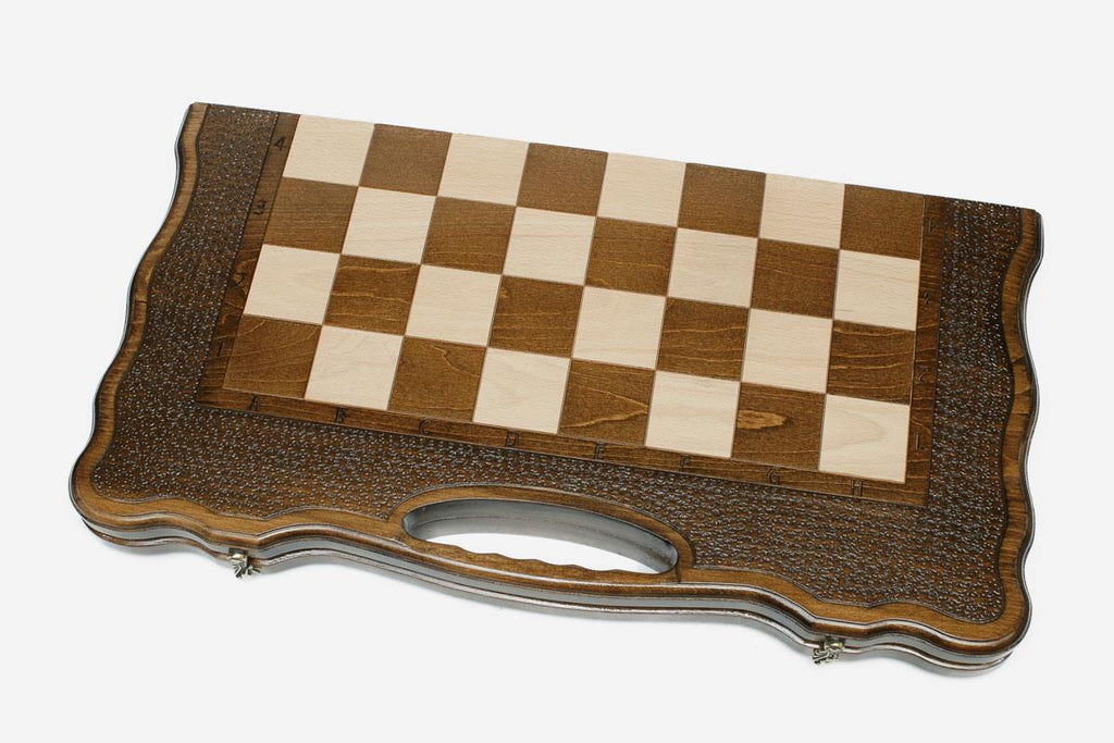 Classic chess and backgammon set shown folded with carry handle