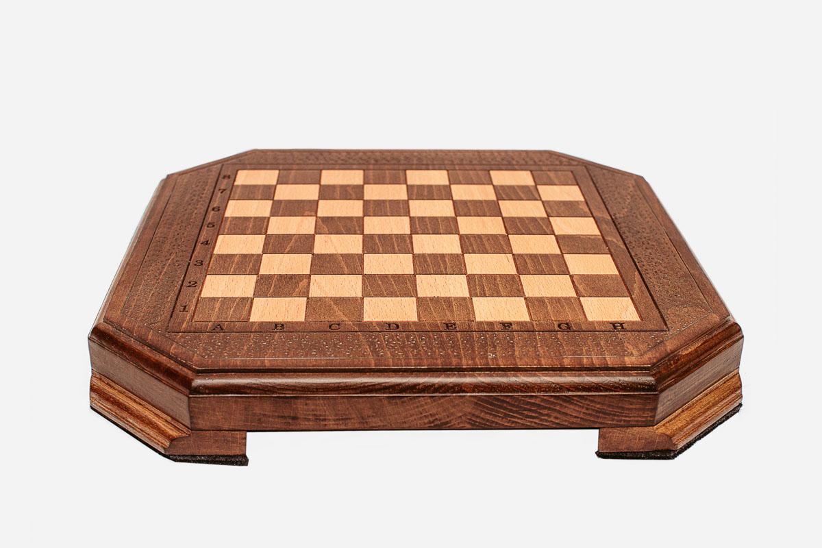 Classic chess set shown folded with carry handle