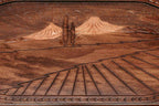 Side view of the folded board with its carry handle