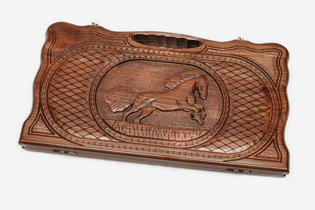 Carved beechwood backgammon board with a horse medallion and a carry handle, propped open