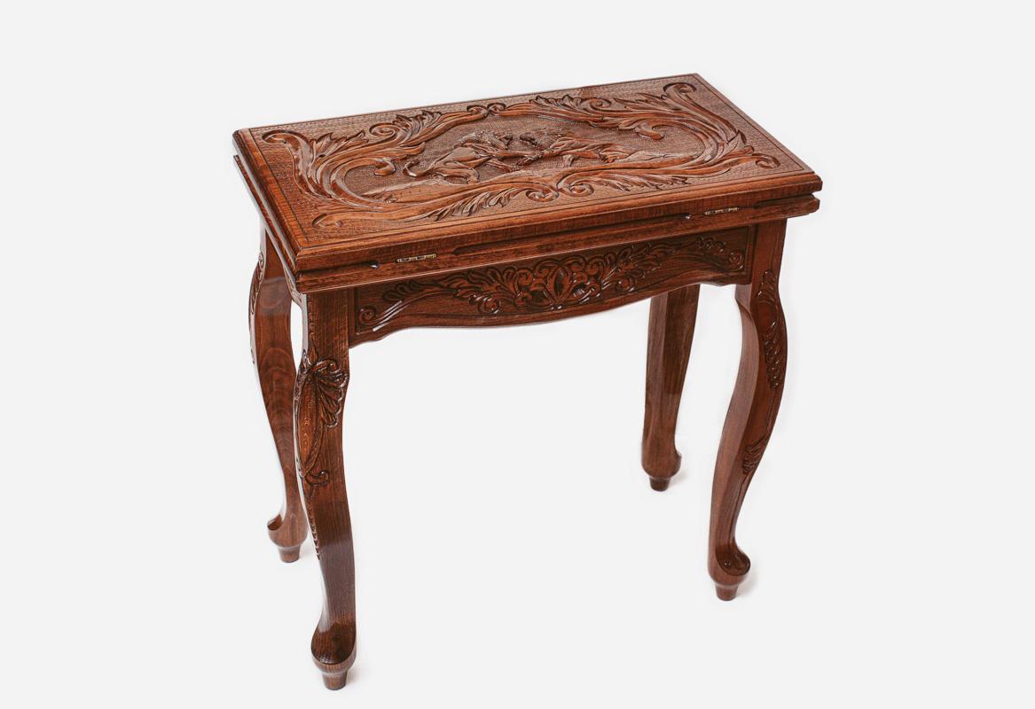 Close-up of the carved lions on the Handle backgammon table lid