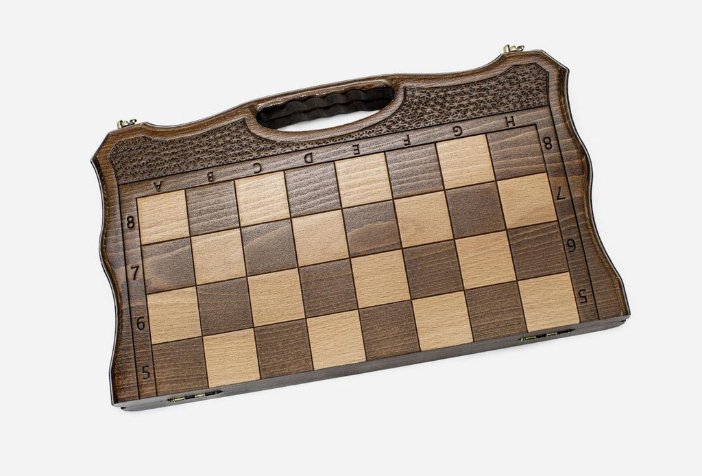The classic folding chess set shown closed with its carry handle