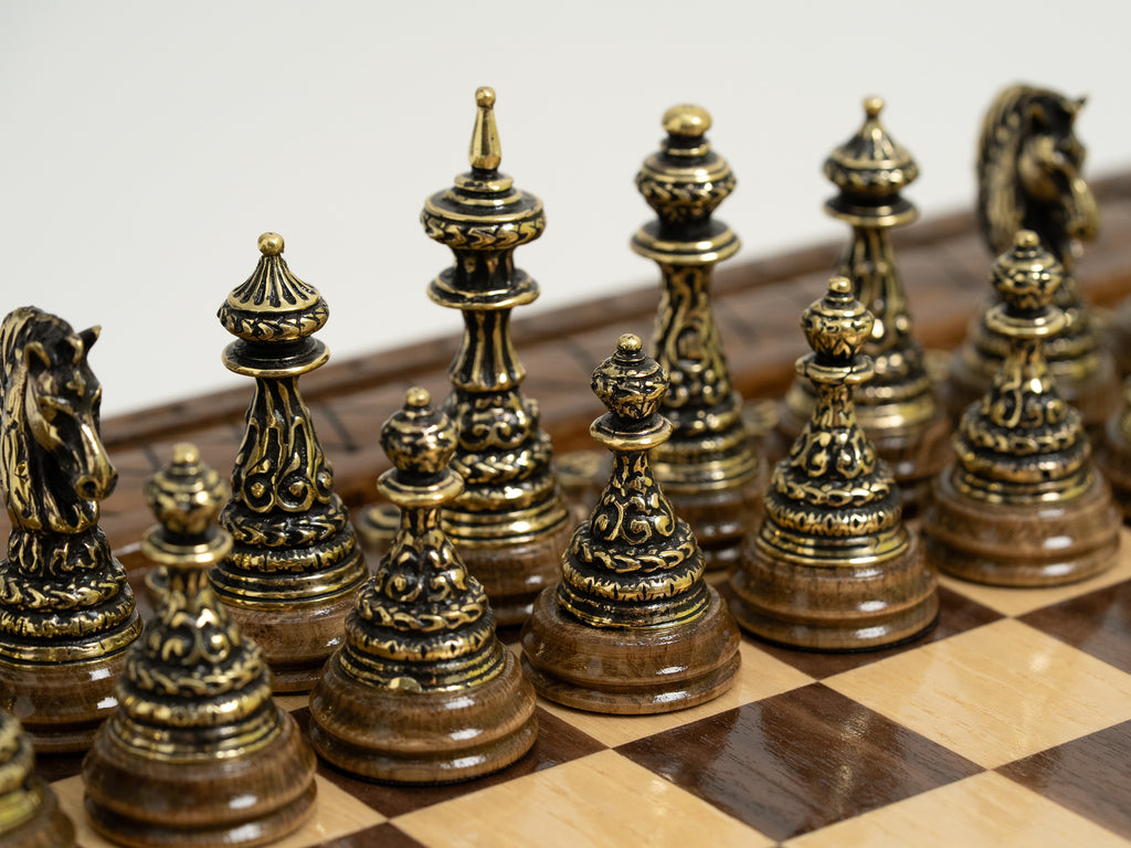 Closed view of a handmade chess set with storage, featuring bronze chess pieces visible inside.