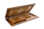 Armenian wooden backgammon set half open, showing carved playing field and bronze hinges