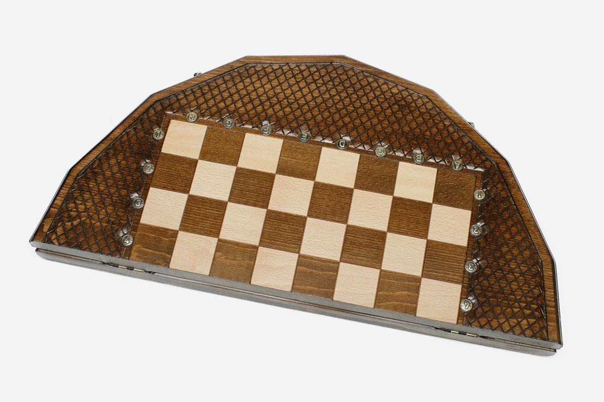Detail of the beech and walnut chess pieces on the inlaid squares