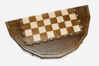 The sixteen-corner folding board shown half-open, revealing its many-sided shape