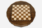 Angled view of the sixteen-corner chess set with its wooden pieces