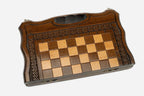 Lattice chess and backgammon set shown folded with carry handle