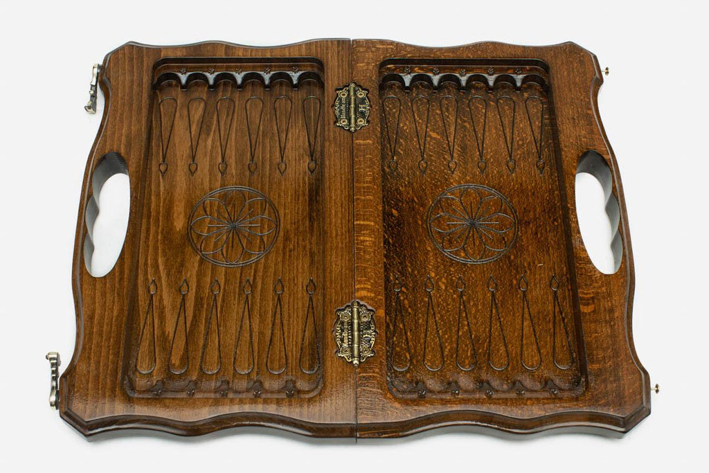 Close-up of a lattice design carving on the beech board