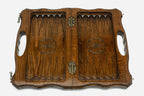 Close-up of a lattice design carving on the beech board