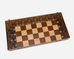 Lattice chess set shown folded with carry handle
