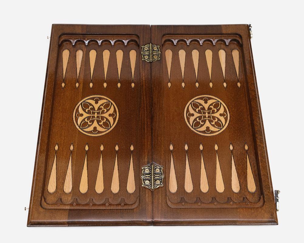 Close-up of a lattice design carving on the beech board