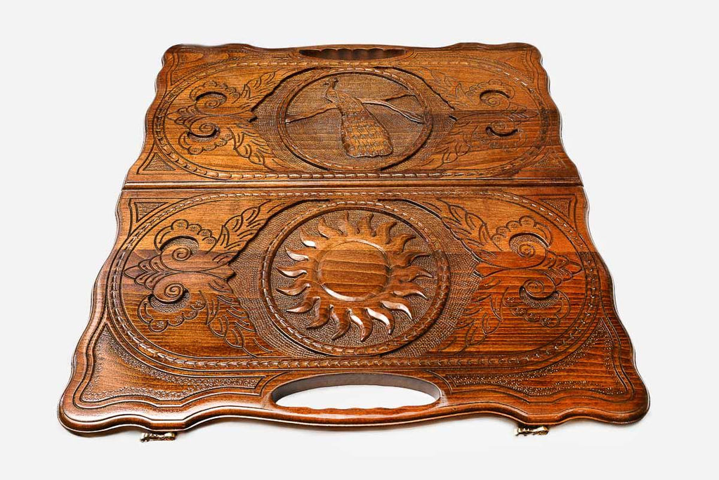 Detail of the floral scrollwork around the medallion