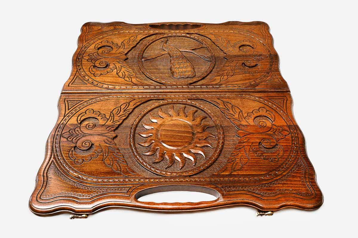Detail of the floral scrollwork around the medallion