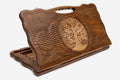 Carved beechwood backgammon board with a tree of life medallion and a carry handle, propped open