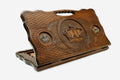 Carved beechwood backgammon board with a crown medallion and bronze accents, with a carry handle, propped open
