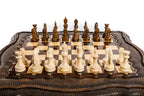 Artistic carving detail on the wooden chess table