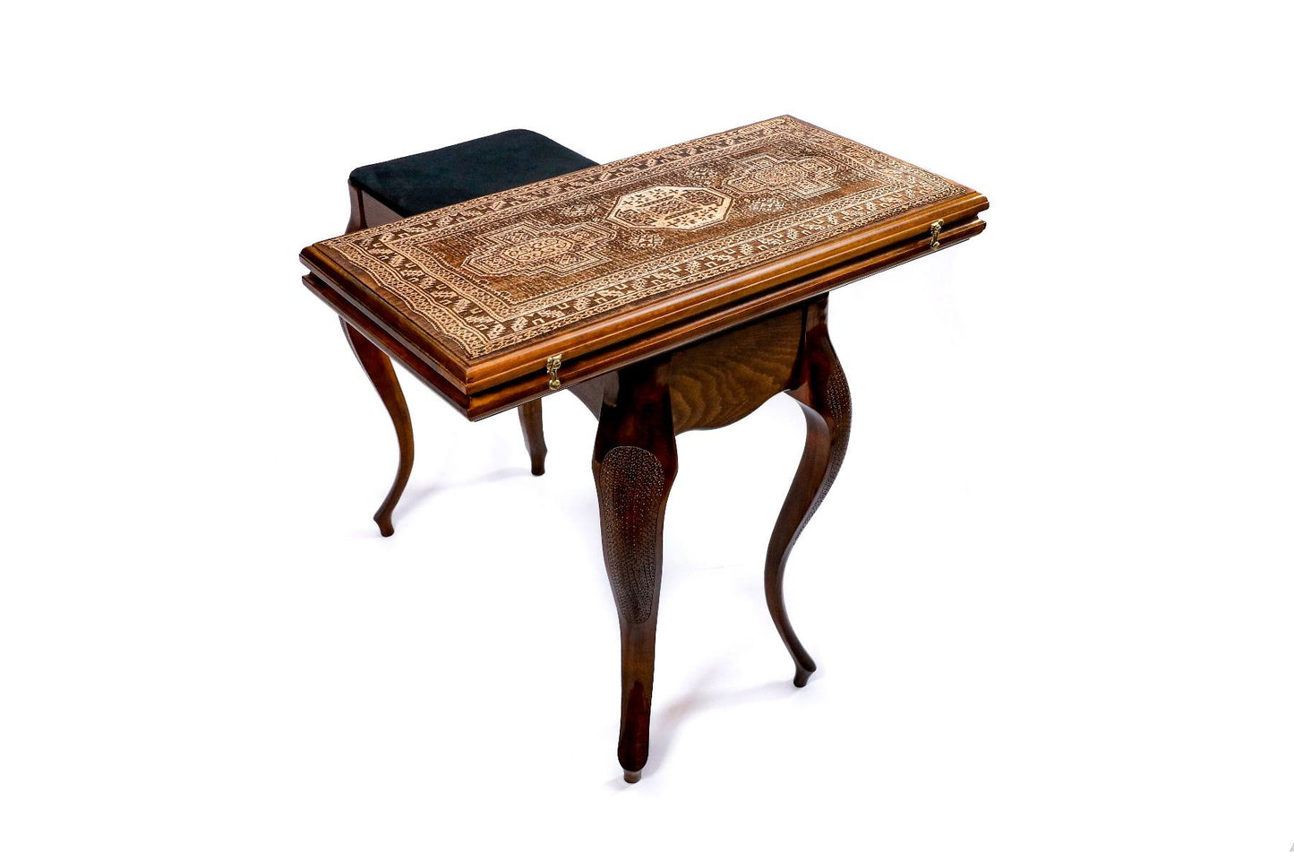 Master Hrachya Ohanyan's signature or maker's mark alongside the Armenian carpet ornament detail on the backgammon table