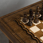 Wooden chess table with matching carved pieces
