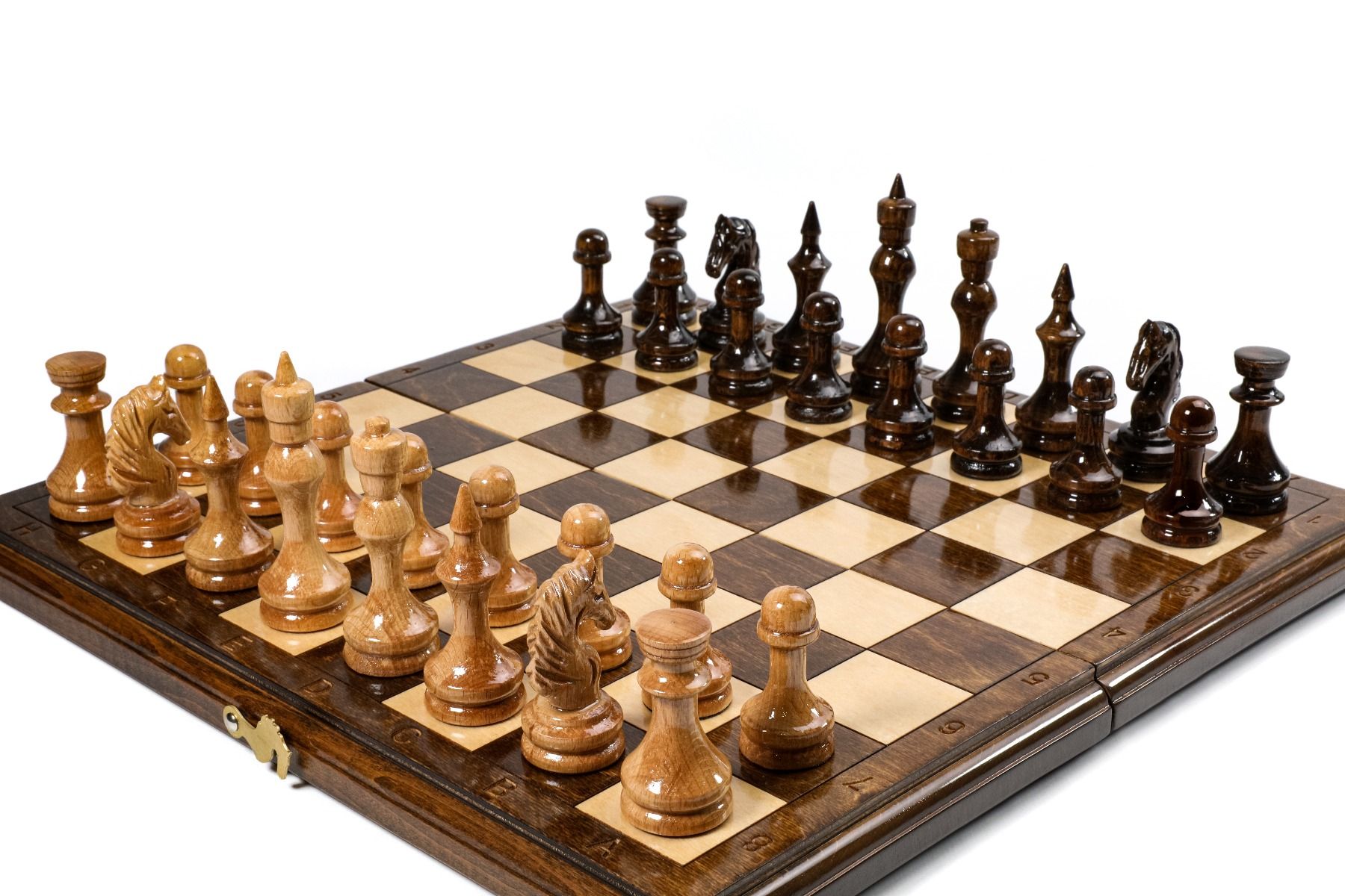 Traditional chess board setup with polished wood design