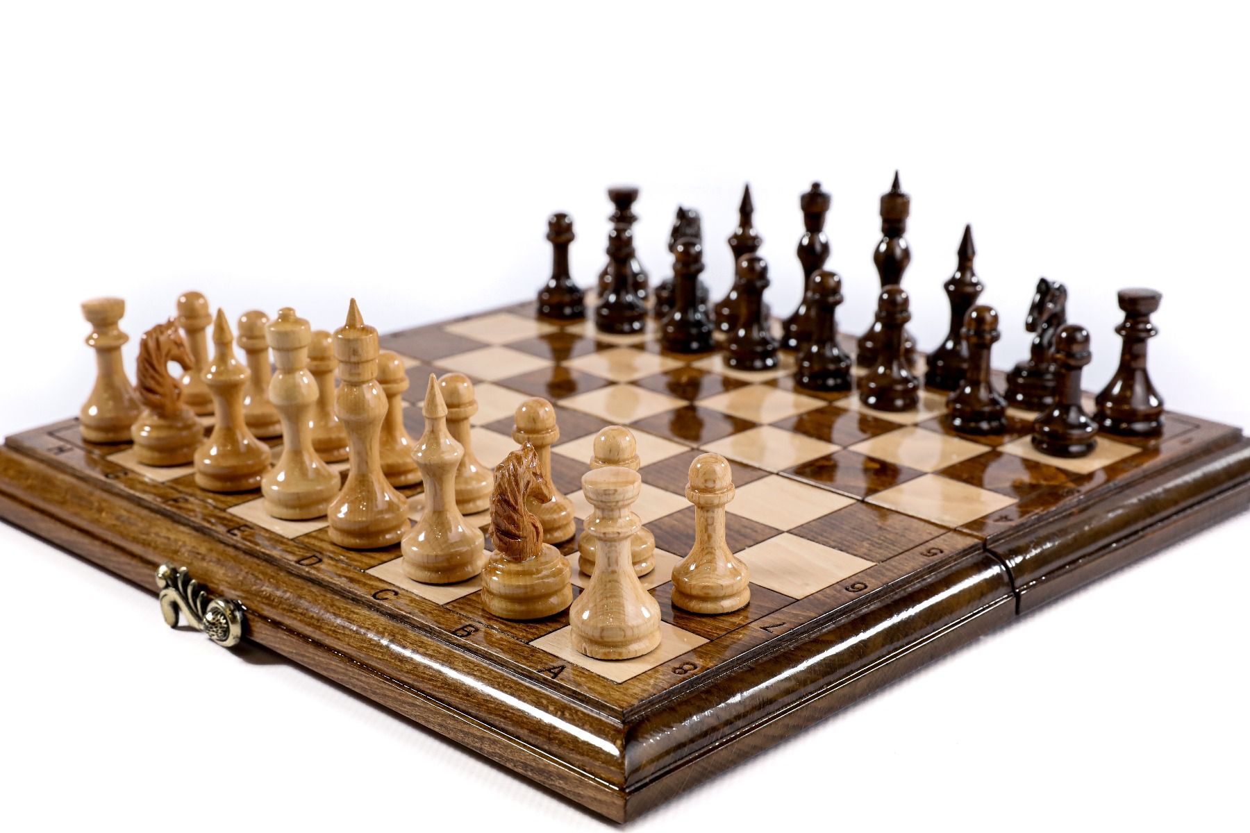 Classic chess set on a polished wooden chess board