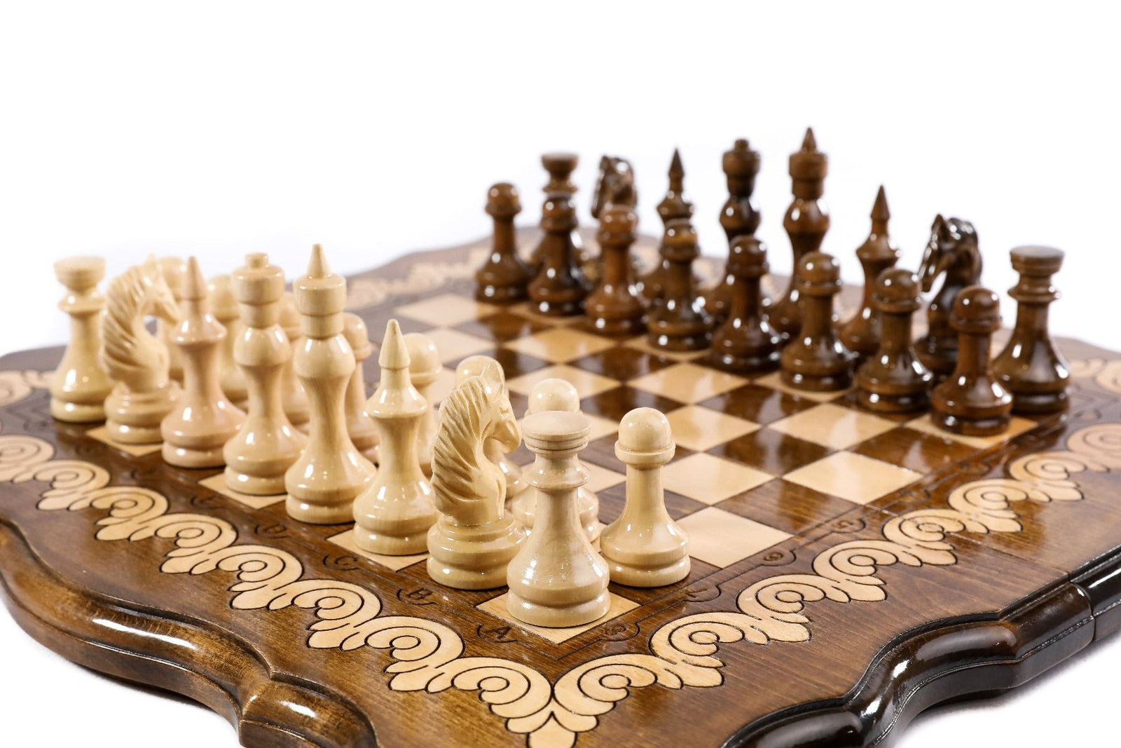 Wooden chess board featuring carved contour detailing and fine craftsmanship