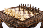 Wooden chess table set up with hand-carved chess pieces