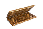 Backgammon board half open, dark field with pale fleur-de-lys points and wheel ornaments