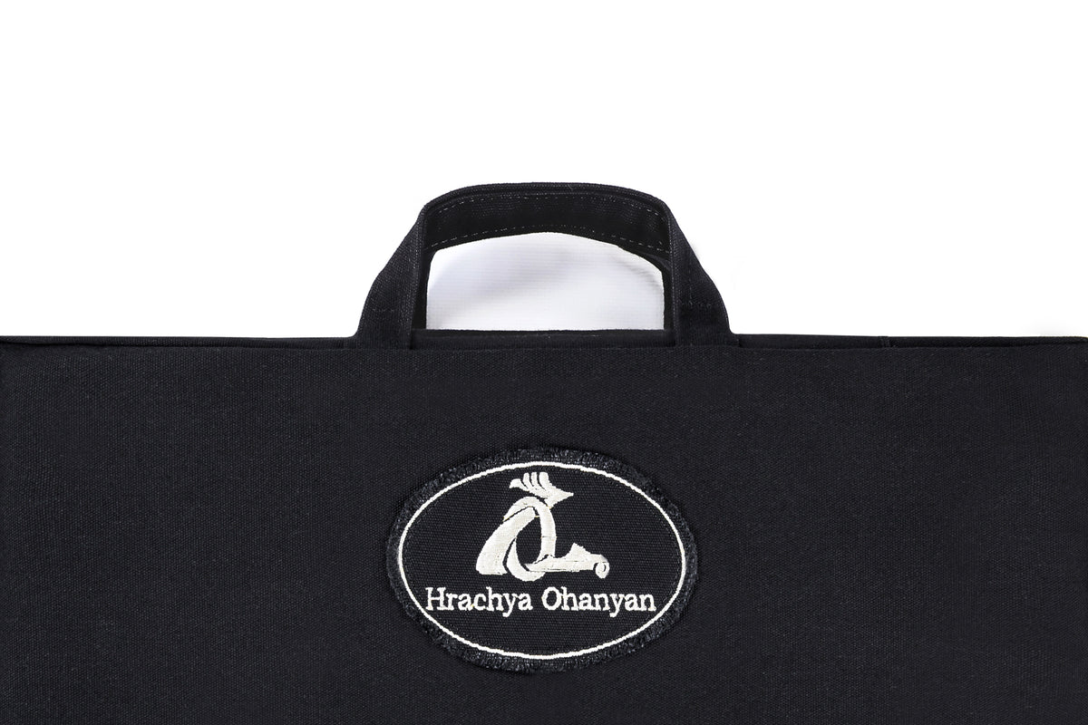Hrachya Ohanyan logo on the black carrying bag, close-up