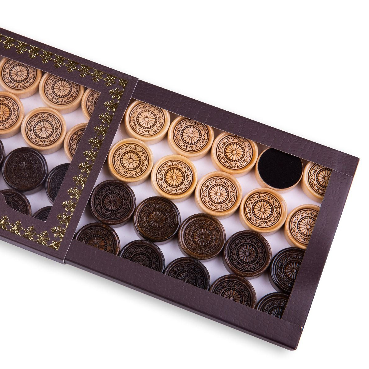 Set of wooden backgammon pieces showing an elegant ornament design.