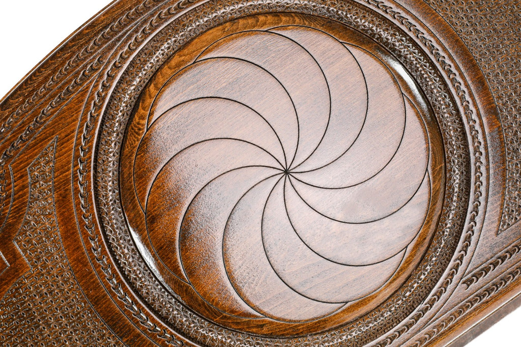 The interior view of the open Hrachya Ohanyan Eternity set highlighting the rich wood grain and professional-grade playing surface.