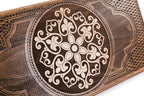 The interior view of the open Hrachya Ohanyan snowflake set highlighting the smooth wood grain and professional-grade playing surface.