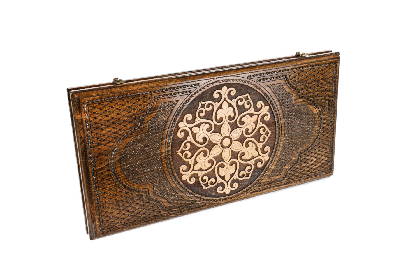 A close-up view of the snowflake's intricate geometric carving, showcasing the depth and precision of the artisan's woodcraft.