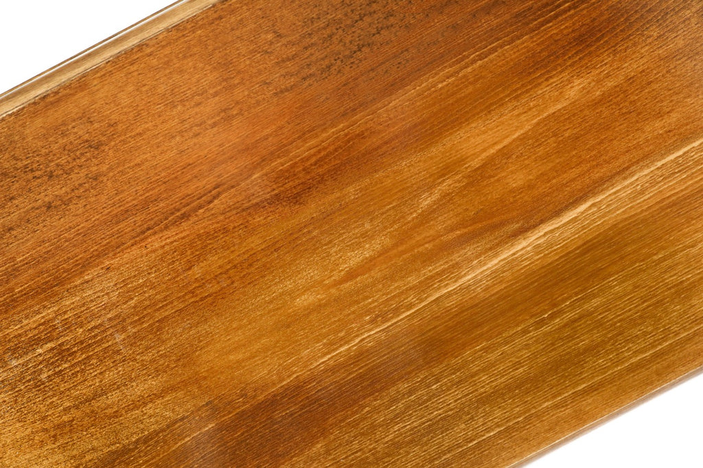 The interior view of the open wooden backgammon board highlighting the glass-smooth playing field and natural wood grain.