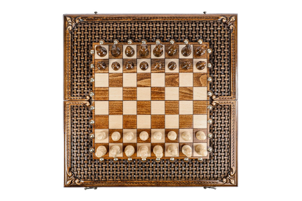 Top-down view of the carved braid chess set with all 32 pieces in starting position