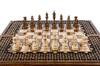 Front view of the luxury chess set with carved braid border and hand-carved pieces in position