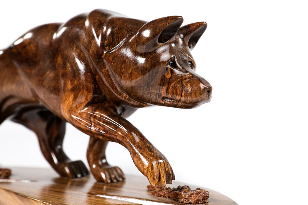 Handmade wooden wolf sculpture — carving detail