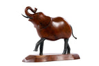 Handmade wooden elephant sculpture — carving detail