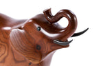 Elephant sculpture in carved apricot wood — side view