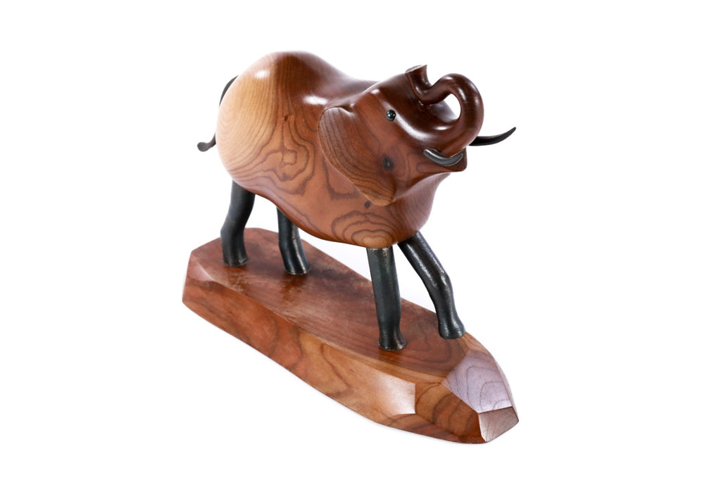 Hand-carved wooden elephant sculpture, 9.4" / 24 cm — full view