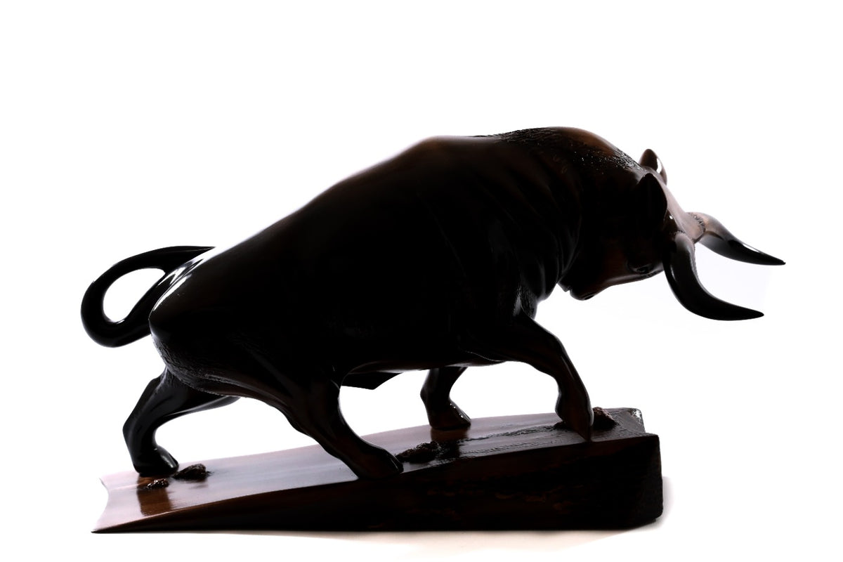 Handmade wooden bull sculpture — carving detail