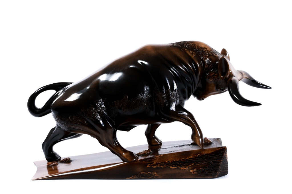 Wooden bull sculpture, natural linden grain detail